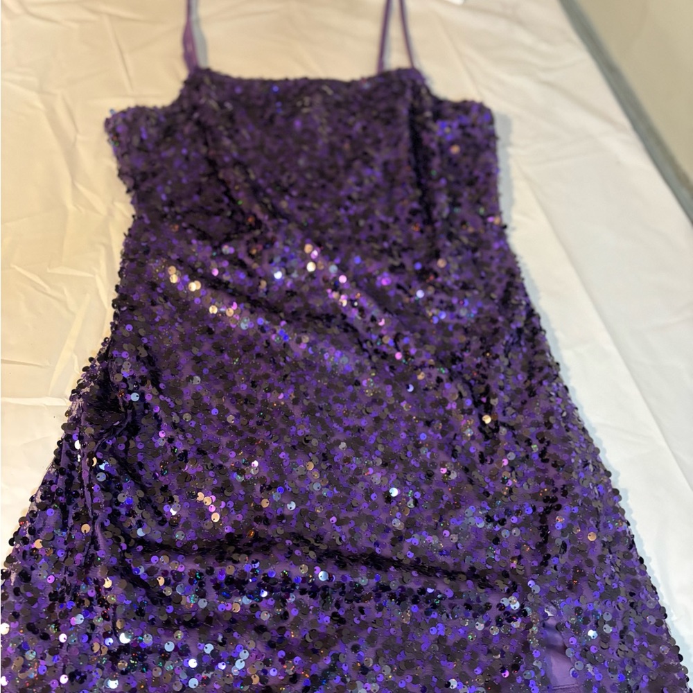 After 5 dress. Purple sequins with a split in the front.